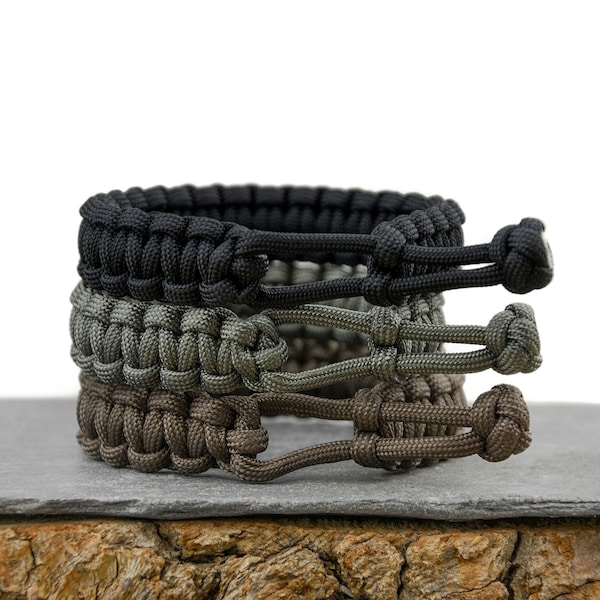 Bracelet de survie réglable en paracorde de style Mad Max - noir, vert feuillage ou gris gun