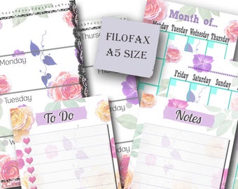 May include: A set of printable floral-themed A5 size planner pages. The pages include a monthly calendar, a to-do list, and a notes section. The pages are decorated with watercolor flowers in shades of pink, purple, and green.