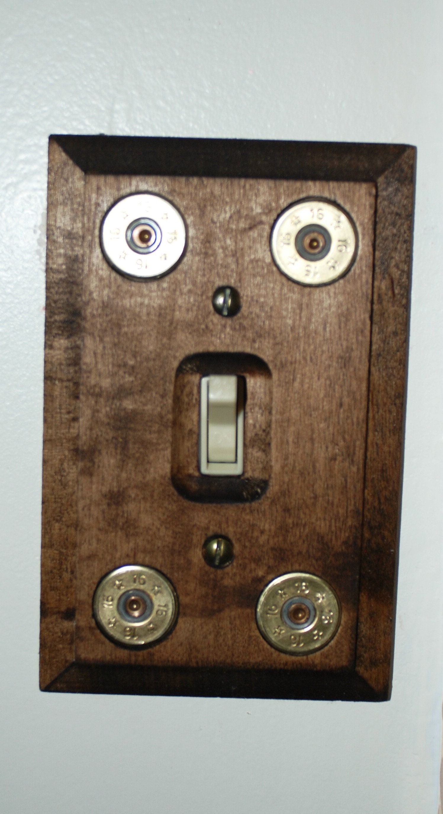 Custom wood light switch covers w/bullets