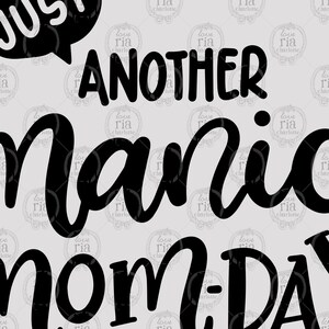 May include: Black and white graphic design with the text "Just another manic mom-day".