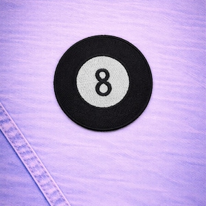 May include: A set of three ceramic mugs with a speckled, matte finish. The mugs are in shades of cream, light gray, and dark gray. Each mug has a simple, minimalist design and a rounded handle.