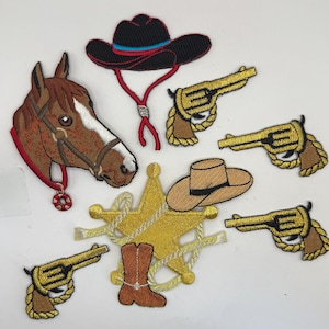 May include: Embroidered patches featuring cowboy and western themes. Includes a horse head, cowboy hats, revolvers, a sheriff's star, and cowboy boots. The patches are in shades of brown, gold, black, and red.