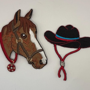 May include: Embroidered patches featuring a horse head and a cowboy hat. The horse head is brown with a white stripe and red accents. The black cowboy hat has red and blue trim and a red chin strap.