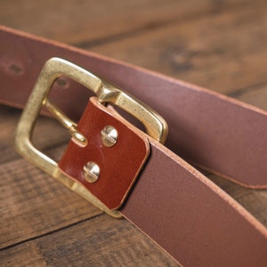 Brown English Bridle Leather Garrison Belt - 1.5 inch wide - detail - back view - close up for solid brass buckle and teardrop holes and belt tip and brass Chicago screws
