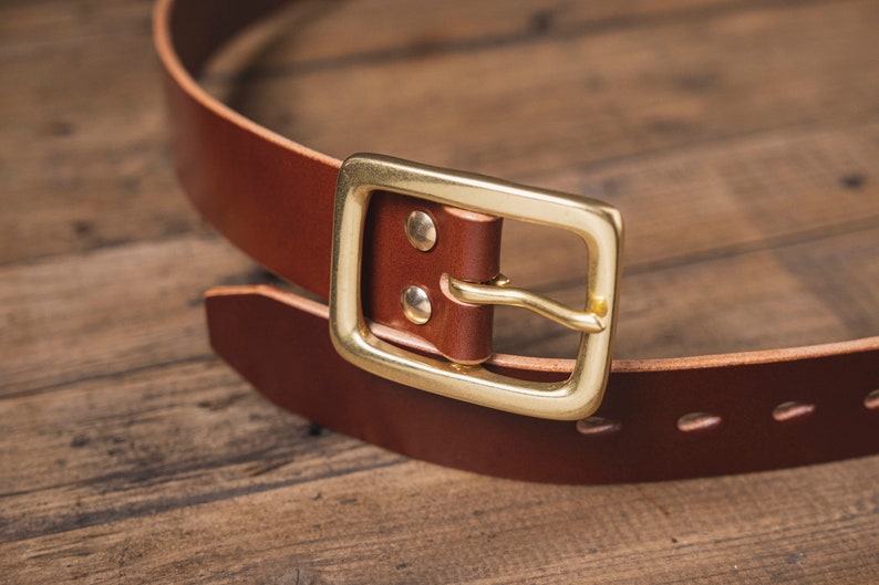 Brown English Bridle Leather Garrison Belt - 1.5 inch wide - detail - close up for solid brass buckle and teardrop holes and belt tip and brass Chicago screws