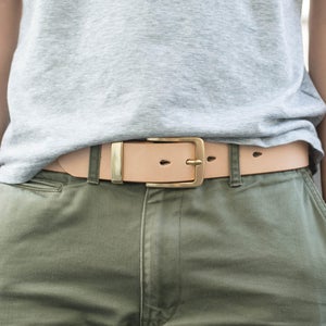 Person wearing a natural Leather standard Belt with cargo pants- Lifestyle view