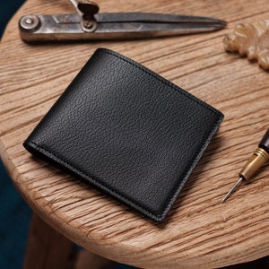 Cartera plegable de 6 ranuras de piel de cabra negra