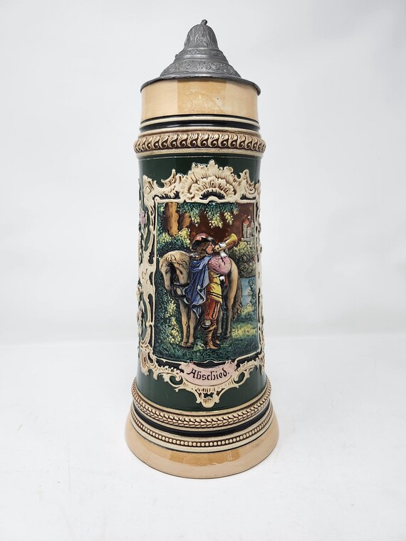 Abschied 1.5 liter Green German Stein,  1910-1920 depicting a trumpeter and horse flanked by German verse, pewter lid marked #203 C