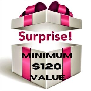 May include: A white gift box with a pink ribbon and bow is open to reveal the text "Surprise!" and "MINIMUM $120 VALUE".