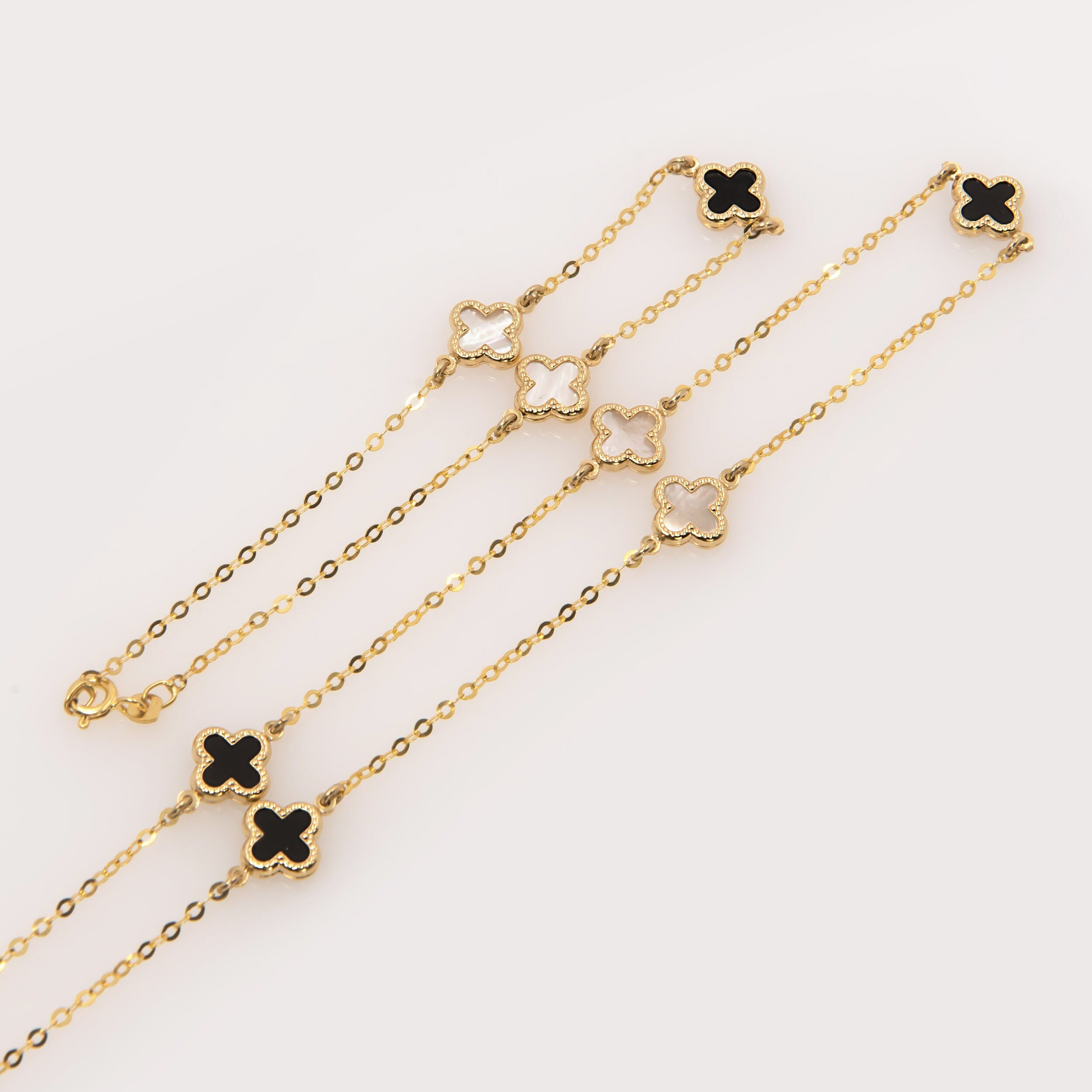 Rackynass Gold Clover Bracelets for Women Lucky Four Clover Designer Jewelry Gold Chain Bracelets (Black)