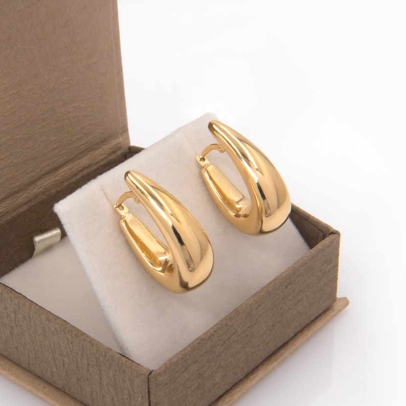 These gorgeous handmade 14k Gold Dome Hoop Chunky Earrings have a unique design  for any other special occasion.
Made of 14k solid gold, they have a chunky dome shape that exudes confidence.
They have an easy to use and secure latch back closure