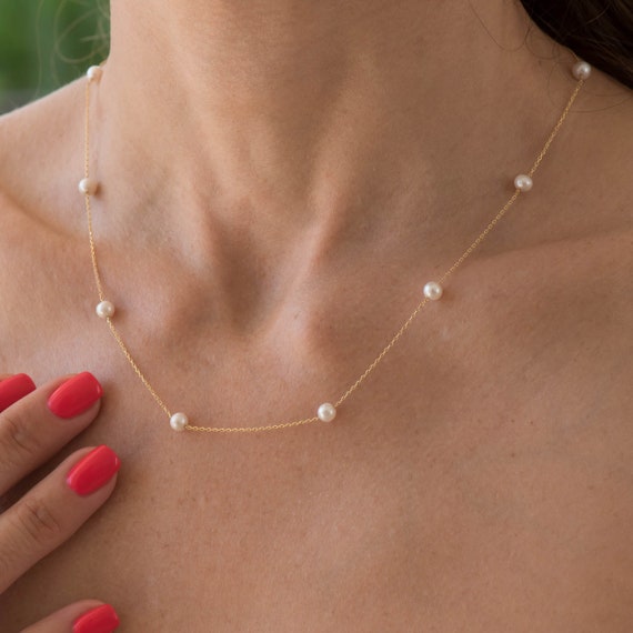 White Pearl Necklace Set with Gold Accents
