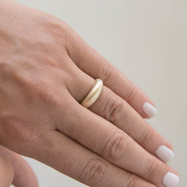 Inspired by great grandmother's wedding band with soft curves. A signature, classic piece you'll wear for every occasion.  Made in solid 14K Gold this dome ring is coming in 3 different options/wide and you can choose matte or bright finish