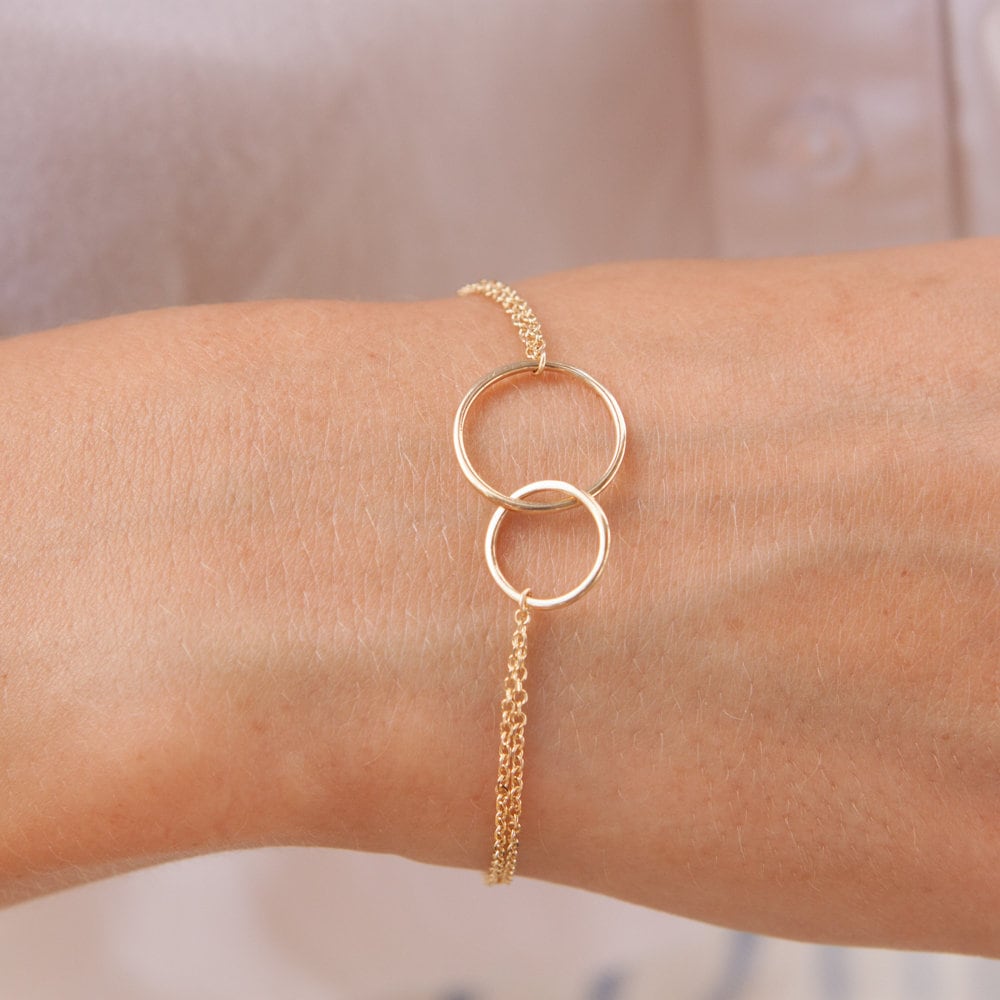 Gold band bracelet store with circles