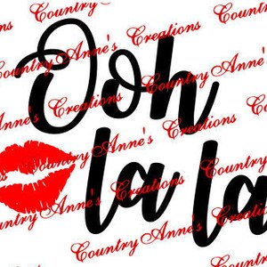 以下が含まれることがあります： 「Ooh la la」というテキストと赤い唇のプリントが施された黒と赤のグラフィックデザインです。