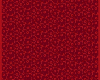 May include: A red fabric with a repeating pattern of dark red stylized flowers.