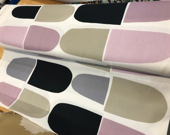 May include: White fabric with a repeating pattern of abstract shapes in black, gray, beige, and pink.
