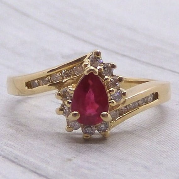 Ruby & Diamond Bypass Ring .71 ctw 14k Yellow Gold