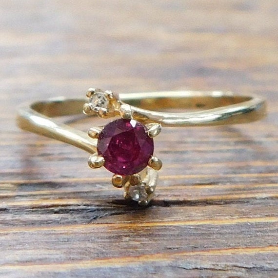 10k Gold .32 ctw Ruby and Diamond Bypass Ring - image 1