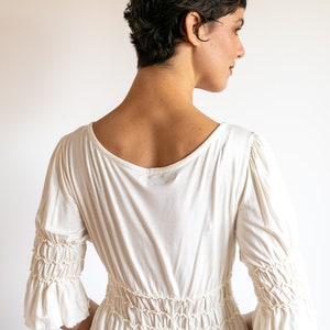 Goddess Sleeve Ruched Empire Waist Top in Cream white