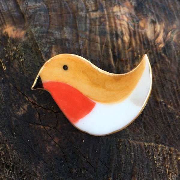 Delightful handmade porcelain Robin Brooch made with care in my Cabin in the Woods studio. This little Robin will cheer up any outfit!