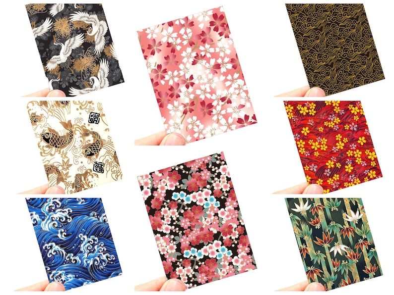 May include: A collection of Japanese-style patterned cards, each held by a hand. Designs include cranes, cherry blossoms, koi fish, waves, and bamboo. Colors range from black and gold to red and pink.