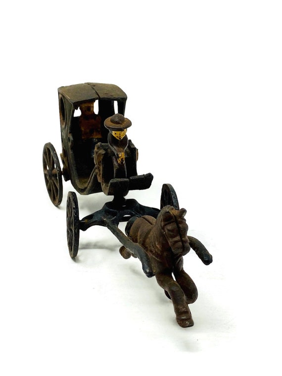vintage cast iron horse and buggy toy