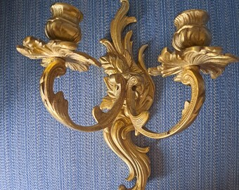 Vintage wall hanging candlestick with two arms in solid brass