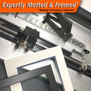 May include: A professional mat cutter with a white and blue mat and a black frame. The image also includes the text "Expertly Matted & Framed" and "* Matting & Framing is Optional".