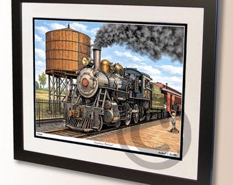 May include: Framed print of a vintage steam train at a station, with a water tower in the background. The train is black and silver with gold accents, billowing dark smoke. A person stands on the platform. The print is in a black frame.