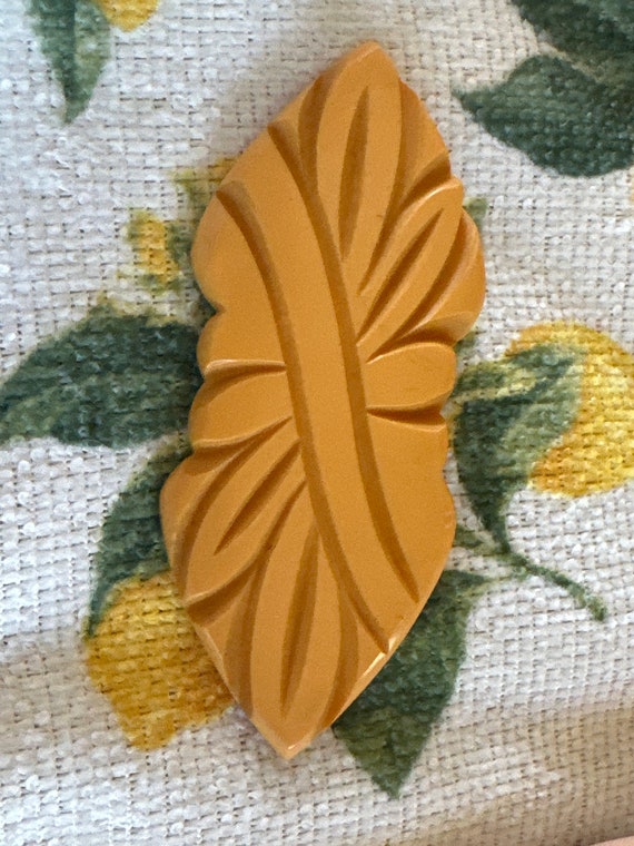 Art Deco Bakelite Brooch Deeply Carved Butterscotc