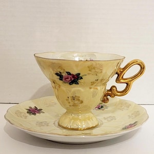 Wales China ? Footed Yellow Floral Lusterware Teacup and Saucer / Japan