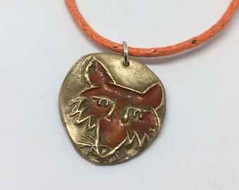 Fox pendant, fox head pendant, handmade pendant in bronze finished with resin and hung on orange cotton cord, fox gift, fox jewellery,