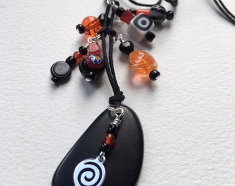 Orange and black necklace, long black tagua nut pendant, with an assortment orange and black beads,plated silver, tagua necklace, tagua