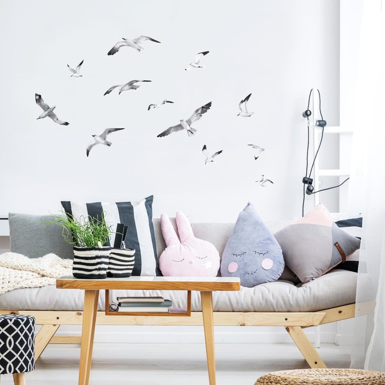 Watercolor seagull wall decals in a scandi inspired livingroom.