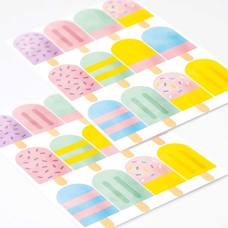 May include: A sheet of colorful popsicle stickers with various designs, including stripes, sprinkles, and solid colors. The stickers are perfect for adding a fun and summery touch to any project.