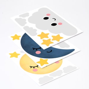 May include: Three sheets of paper with cute illustrations of a sleeping moon, a sleeping sun, and a cloud with a smiling face. Each sheet has yellow stars.
