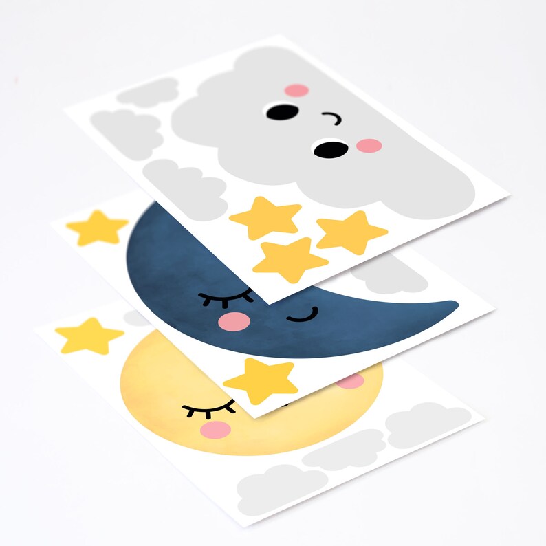 May include: Three sheets of paper with cute illustrations of a sleeping moon, a sleeping sun, and a cloud with a smiling face. Each sheet has yellow stars.