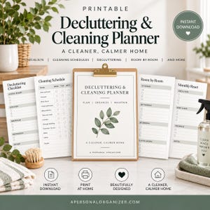 May include: A printable decluttering and cleaning planner on a clipboard with multiple pages showing checklists, cleaning schedules, and room-by-room organization. The pages feature green leaf illustrations and text including Decluttering & Cleaning Planner.