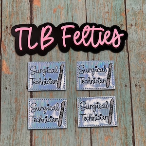 May include: Four blue and silver iridescent iron-on patches with the text "Surgical Technician" and a small image of a scalpel.