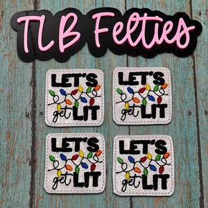 May include: Four white felt patches with the text "Let's get lit" and a string of colorful lights. The patches are perfect for adding a festive touch to any project.