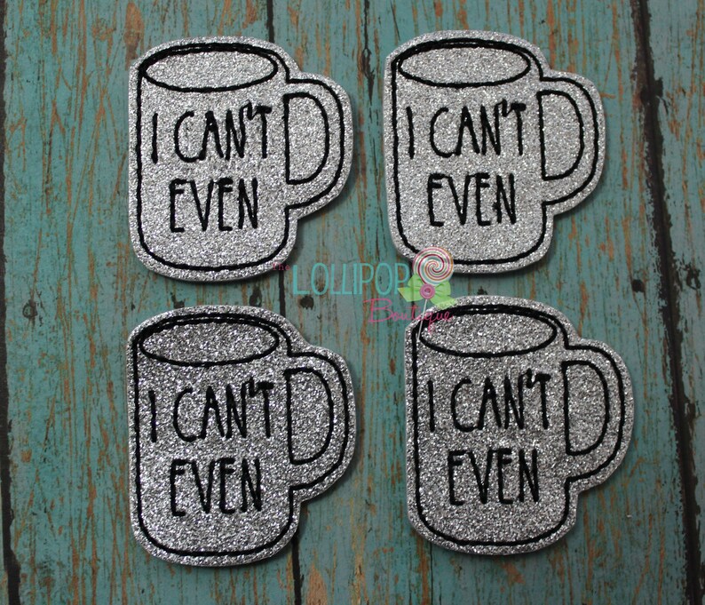 May include: Four silver glitter iron-on patches shaped like coffee mugs with the text "I can't even" in black.