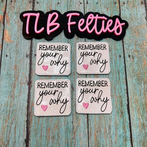 May include: Four square patches with the text "Remember your why" and a pink heart, along with a black and pink logo that says "TLB Feeties". The patches are white with a glittery texture.