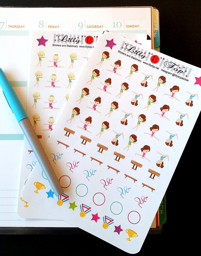 May include: Two sheets of stickers featuring a gymnast in various poses. The stickers are on a white background with pink, blue, green, yellow, and gold accents. The stickers are from Lilly Top Stickers and Stationary. The text "Lilly Top" is on the bottom right corner of the sheet.