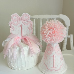 Pink First Birthday Decor - Pink Coquette First Birthday - Pink Bows First Birthday - ONEderful - High Chair Banner, Party Hat, Cake Topper Hat & Cake Topper