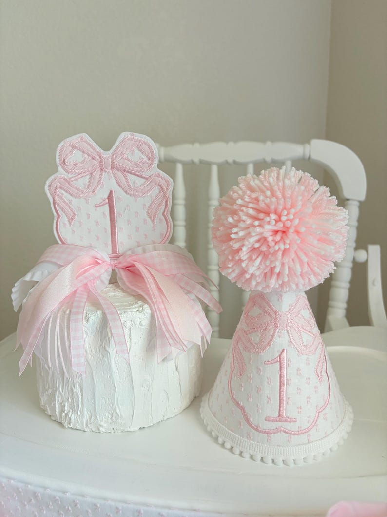Pink First Birthday Decor - Pink Coquette First Birthday - Pink Bows First Birthday - ONEderful - High Chair Banner, Party Hat, Cake Topper Hat & Cake Topper