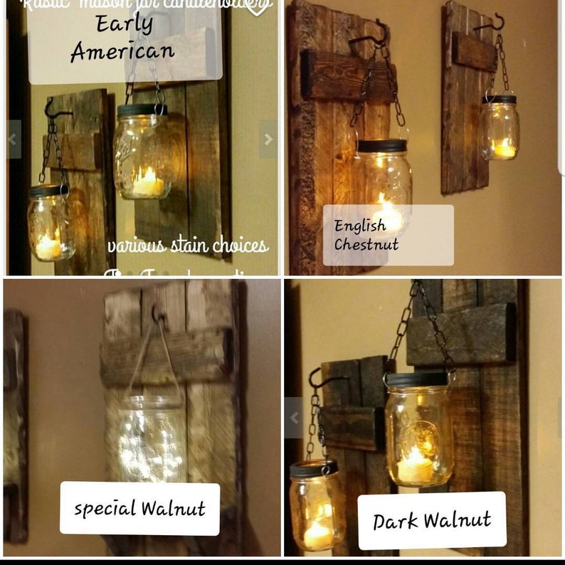May include: Four rustic wooden wall sconces with mason jars hanging from chains. The sconces are stained in different colors: Early American, English Chestnut, Special Walnut, and Dark Walnut.