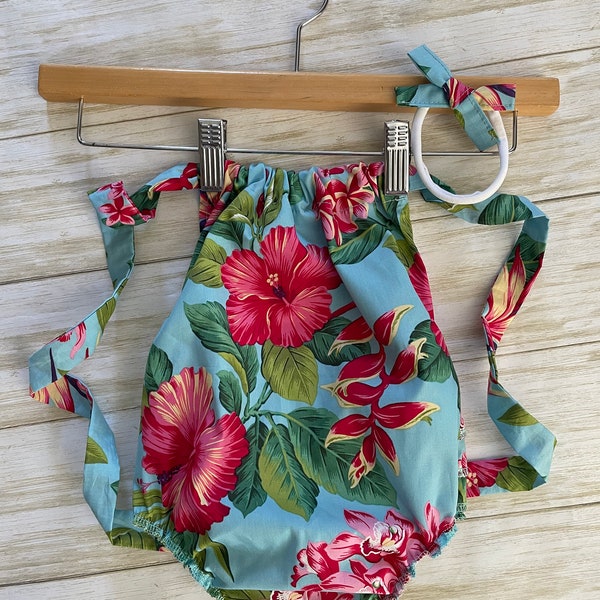 Mono/traje de baño para bebé niña con temática de la isla y diadema a juego.