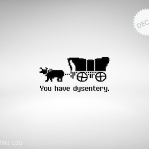 May include: Black and white pixel art design of a covered wagon pulled by an ox with the text "You have dysentery."