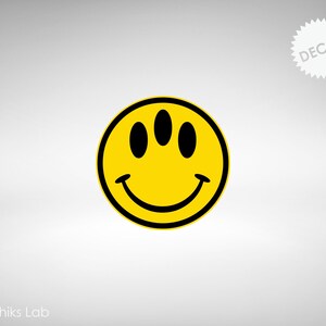 May include: Yellow smiley face decal with three black eyes and a black outline. The decal is on a white background.